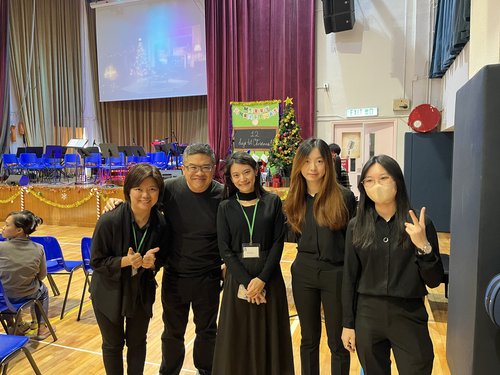 A group photo of Ringo, Lorraine, Sophie, Natalie and another teacher at the school.