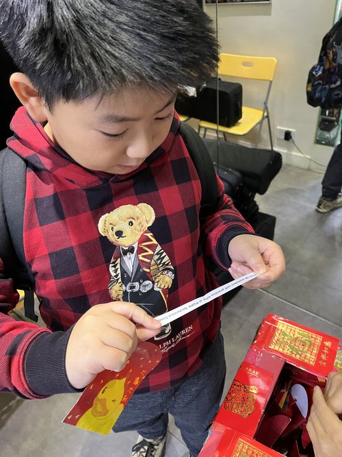 He's satisfied with his prize and pocket money from the lucky draw!