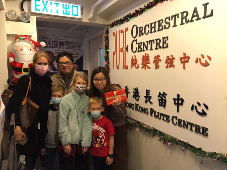 This is a group photo with Ringo, Linda, a few fellow students with their mom, after having the music lesson.