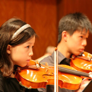 Our students are very focused on playing the violin well!